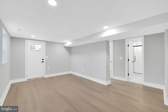 foyer entrance featuring light wood-type flooring