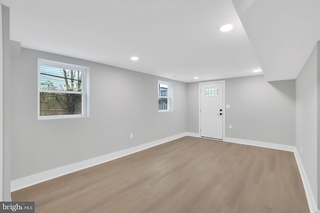 entrance foyer featuring hardwood / wood-style floors