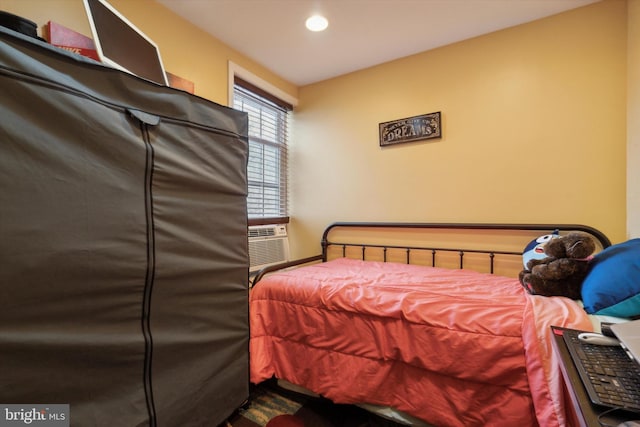 bedroom featuring cooling unit