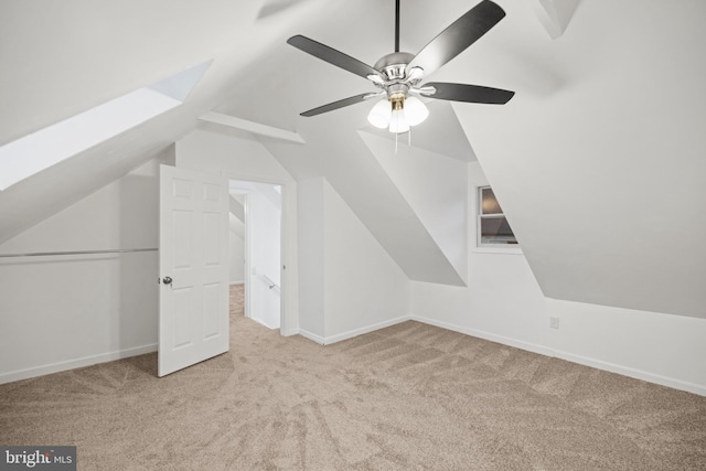 7213 Tyler Ave, Falls Church, VA 22042 - additional living space with carpet flooring, a ceiling fan, baseboards, and lofted ceiling with skylight