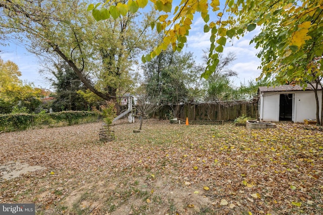7213 Tyler Ave, Falls Church, VA 22042 - view of yard with a storage shed, an outbuilding, and fence