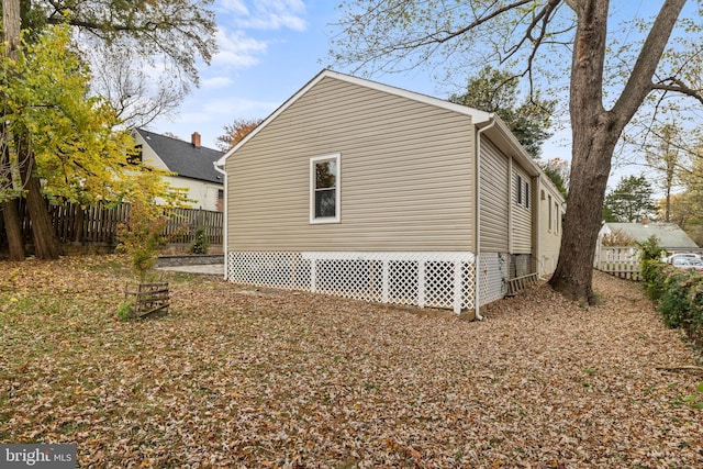 7213 Tyler Ave, Falls Church, VA 22042 - view of home's exterior with fence and crawl space
