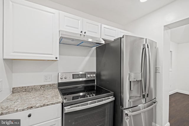 7213 Tyler Ave, Falls Church, VA 22042 - kitchen featuring under cabinet range hood, baseboards, white cabinetry, stainless steel appliances, and dark wood-style floors