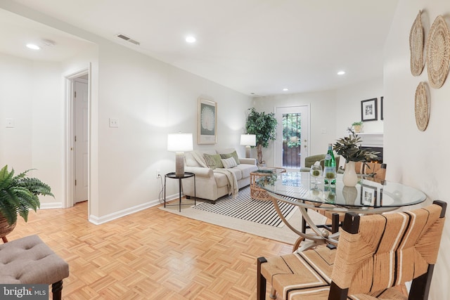 living room with light parquet floors