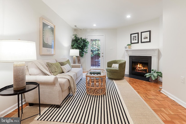 living room featuring parquet floors