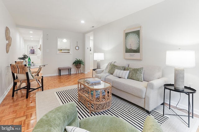 living room featuring light parquet flooring