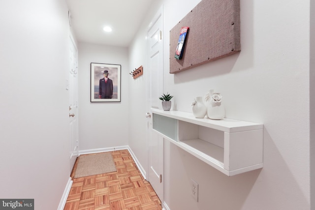 hallway featuring light parquet floors