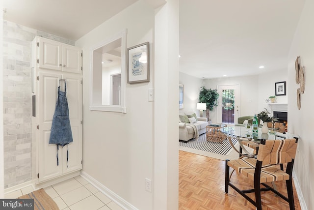 bathroom featuring parquet flooring