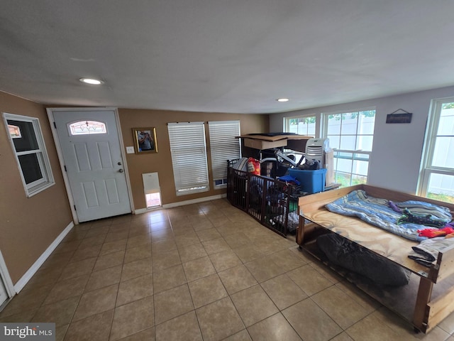 foyer with tile patterned flooring