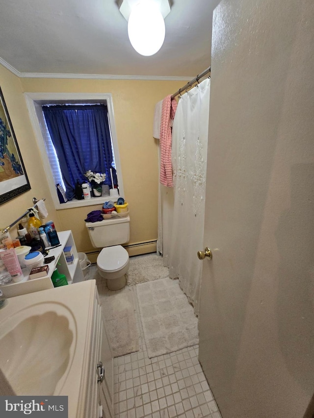 bathroom featuring tile patterned flooring, a baseboard radiator, crown molding, vanity, and toilet