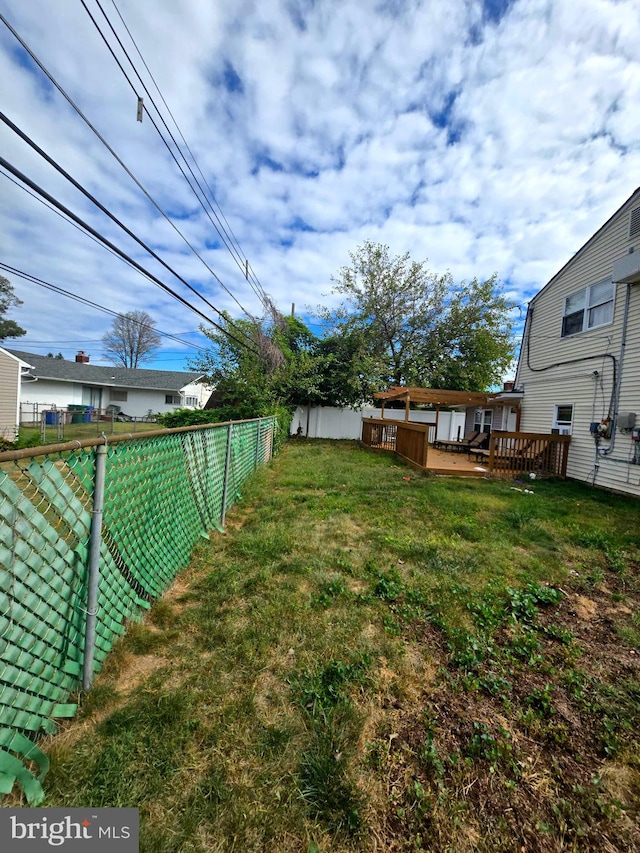 view of yard featuring a deck