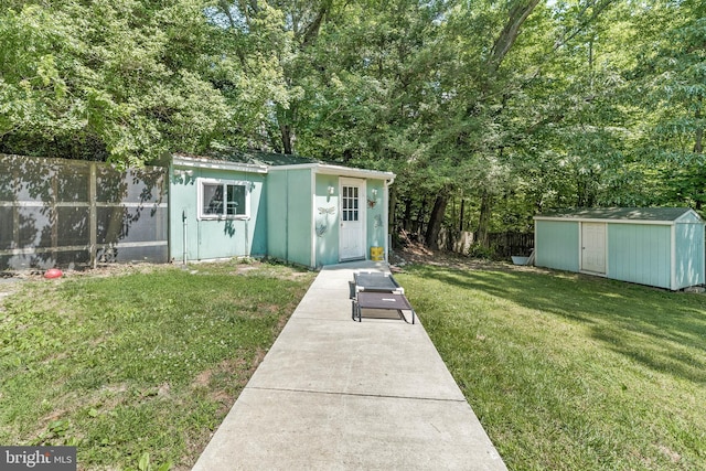 exterior space featuring a front yard and a storage unit