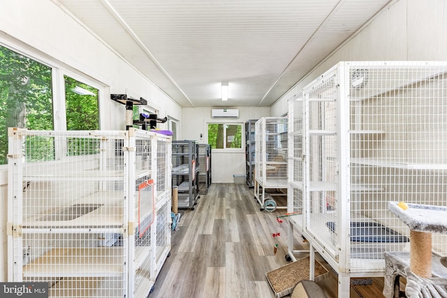 storage area featuring a wall mounted AC