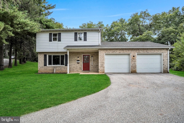 front facade with a garage and a front lawn