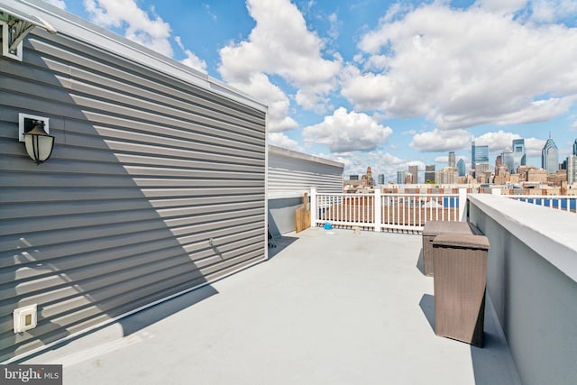 view of patio / terrace with a balcony