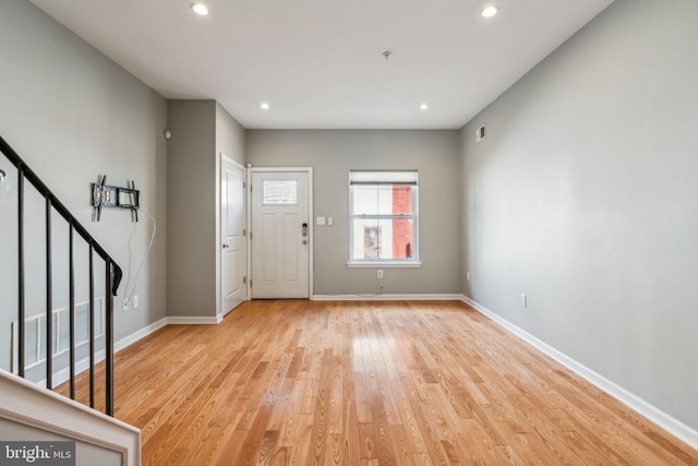 entrance foyer with light hardwood / wood-style floors