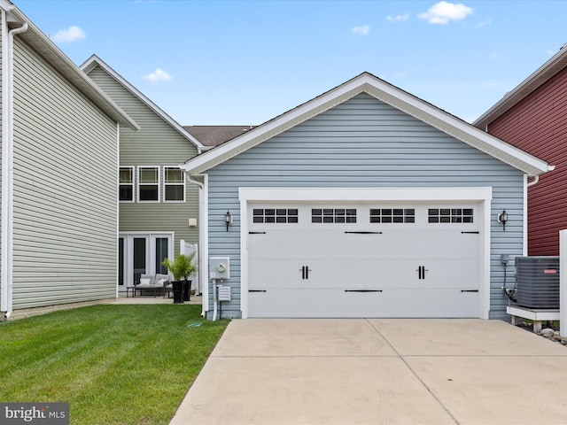 view of front of house featuring a front yard, a garage, and central air condition unit