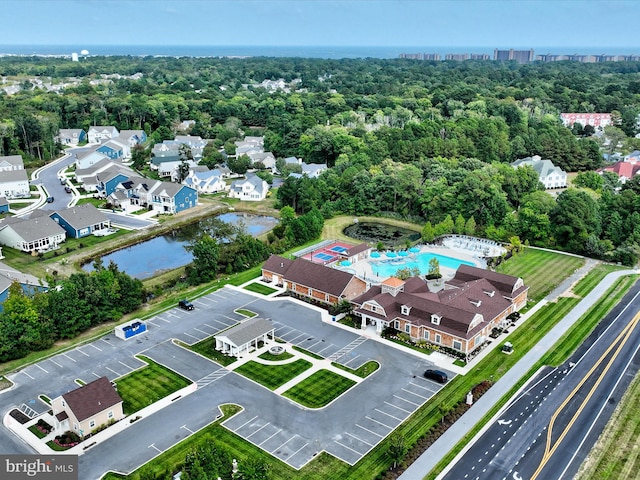 birds eye view of property featuring a water view