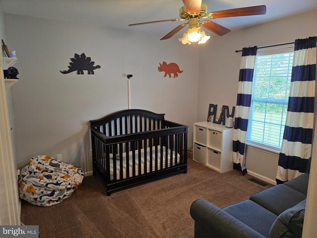 910 Sapphire Ct, Salisbury, MD 21804 - bedroom with carpet, multiple windows, baseboards, and a ceiling fan