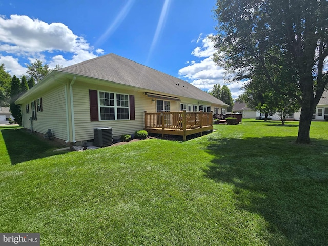 910 Sapphire Ct, Salisbury, MD 21804 - back of property with a deck, a yard, central AC, and roof with shingles