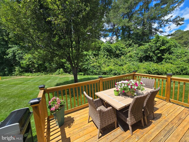 910 Sapphire Ct, Salisbury, MD 21804 - wooden terrace with a lawn and outdoor dining space