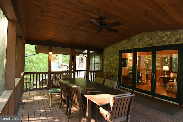 wooden terrace featuring ceiling fan