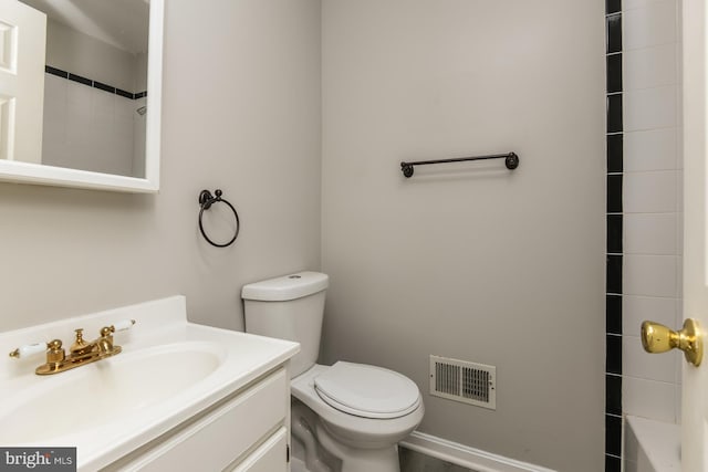 full bathroom featuring vanity, toilet, and plus walk in shower