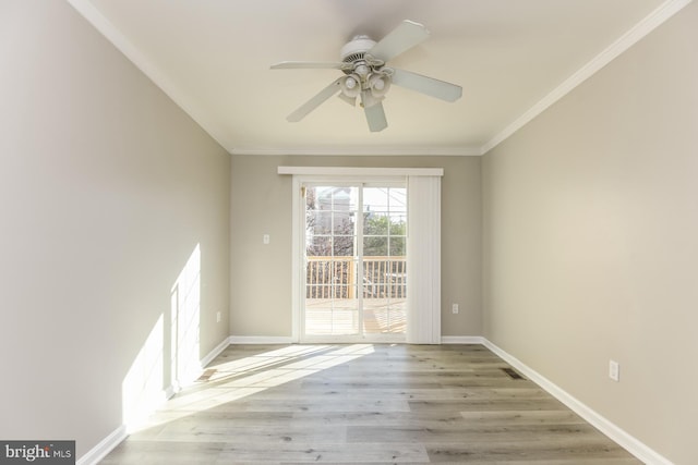 unfurnished room featuring ceiling fan, ornamental molding, and light hardwood / wood-style floors