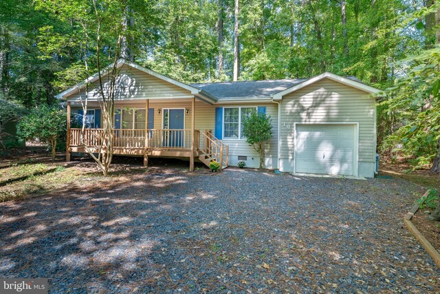 single story home featuring a garage