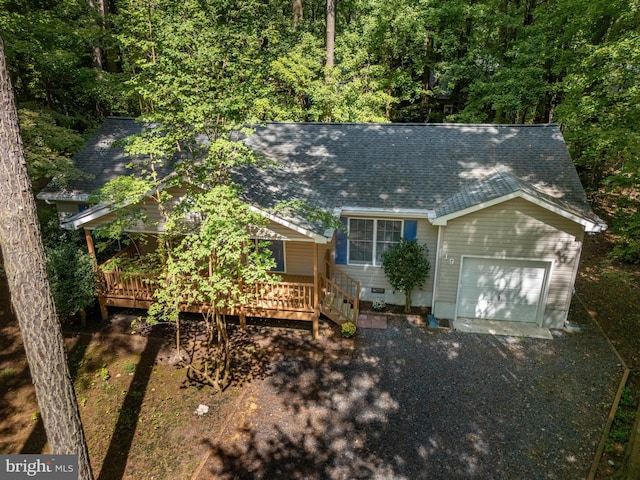 view of front of home with a wooden deck