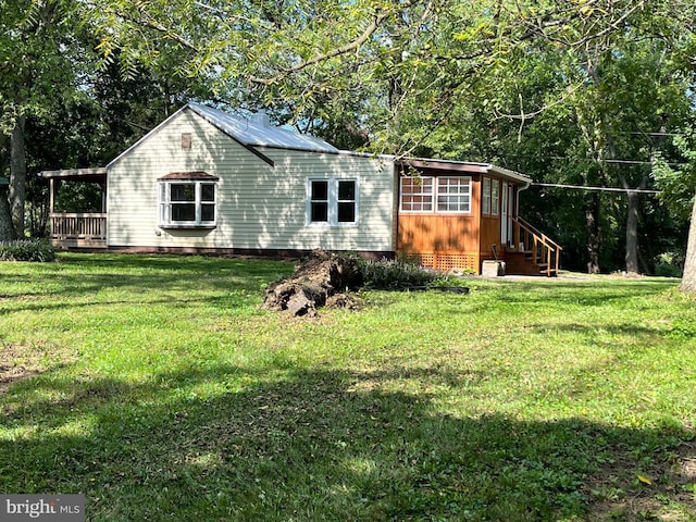 view of front of home with a front yard