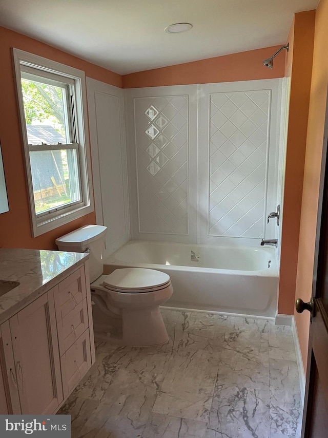 full bathroom with vanity, toilet, and washtub / shower combination