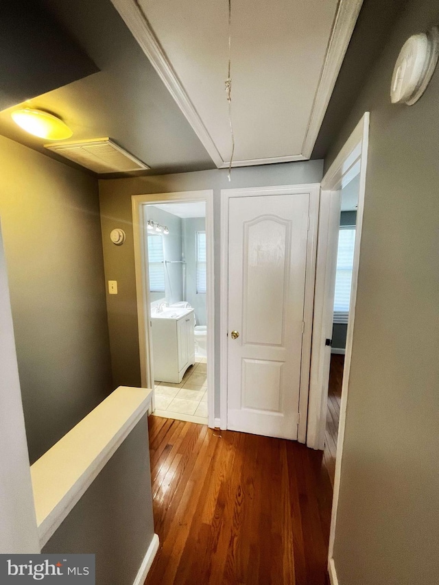 hallway featuring hardwood / wood-style flooring