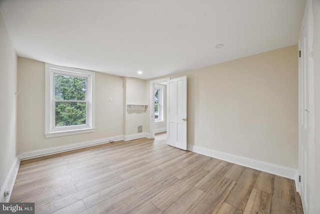 empty room featuring light hardwood / wood-style floors