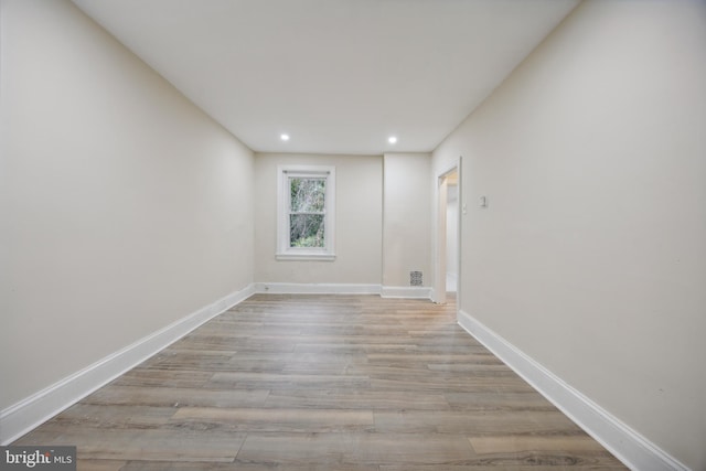 empty room with light wood-type flooring