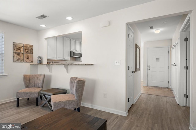 living area featuring wood-type flooring