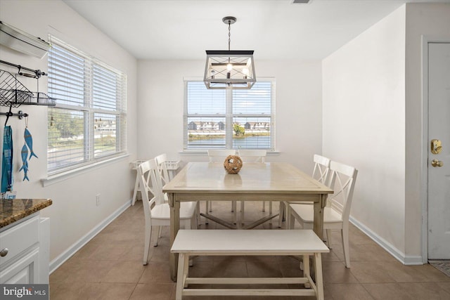 dining space with light tile patterned flooring