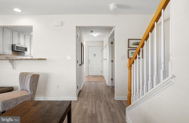 corridor featuring light wood-type flooring