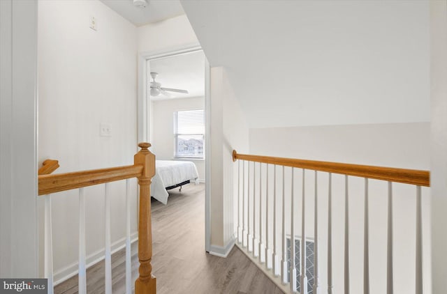 corridor featuring light hardwood / wood-style floors