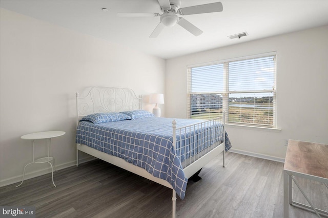 bedroom featuring ceiling fan and wood-type flooring