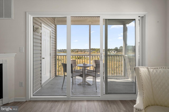 doorway featuring hardwood / wood-style flooring