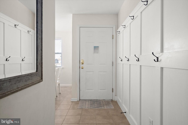 mudroom featuring light tile patterned floors