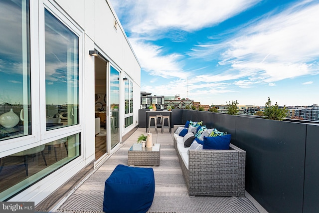 balcony with an outdoor hangout area