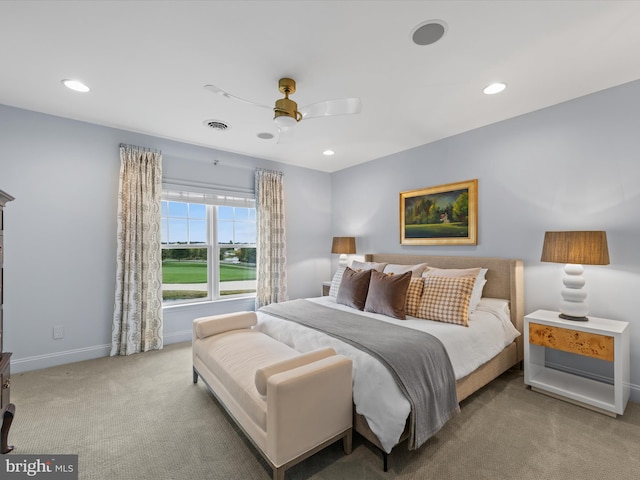 bedroom featuring ceiling fan and light colored carpet