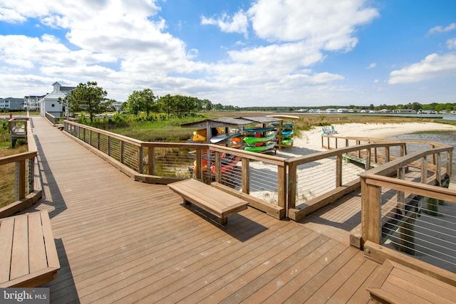 deck featuring a water view