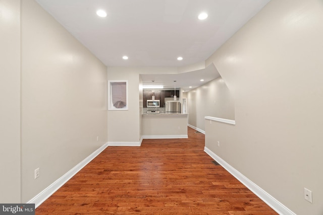 hall featuring hardwood / wood-style floors