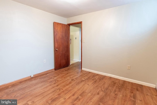 empty room with light wood-type flooring