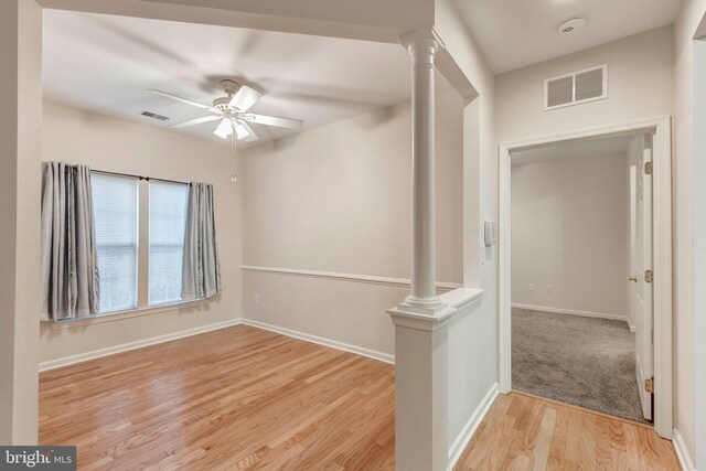 kitchen with backsplash, stainless steel appliances, and light wood-type flooring