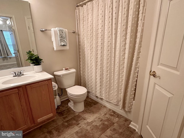 full bathroom with vanity, toilet, and shower / bathtub combination with curtain