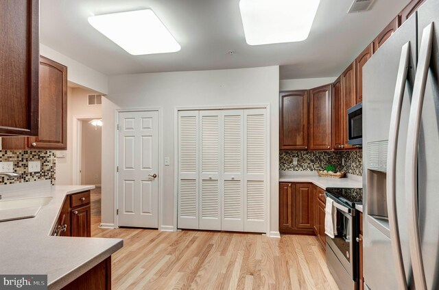 unfurnished bedroom featuring dark carpet and a closet